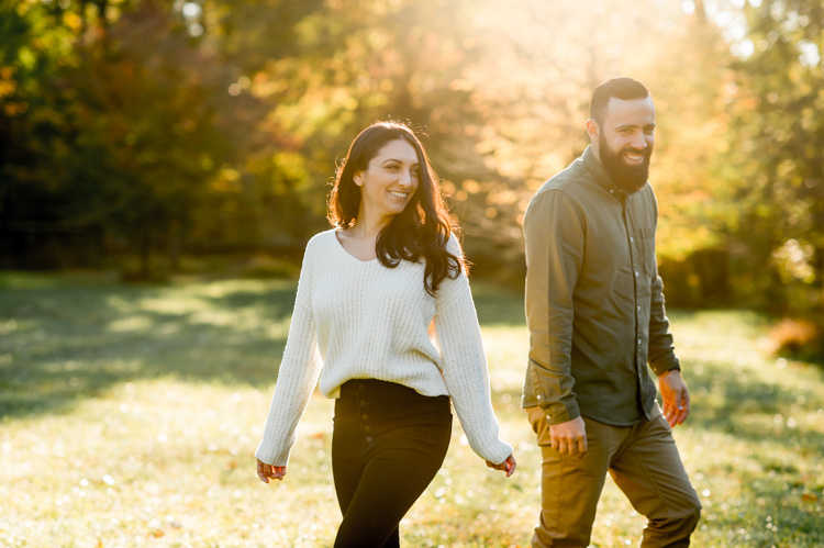 Chilly fall morning, feeling icy wind on our skin at Cross Estate Gardens for Allie and Nick’s engagement session. What we expected to be a warm morning ended up being freezing but once the sun came up the warmth followed. To warm Allie and Nick up little bit, I had them run across the field toward the sunrise, most gorgeous scene to be watching by myself. Cross Estate Gardens with it’s unique variety of backdrops it’s a photographer’s dream location really. It was so early that we were the only people there and with Allie and Nick we got to know each other and I documented their love at Cross Estate Gardens NJ. Cross Estate Gardens NJ engagement with Allie and Nick photographed by Karis from Hey Karis. Photograph is like freezing time, motion in print, movie turned into a book.